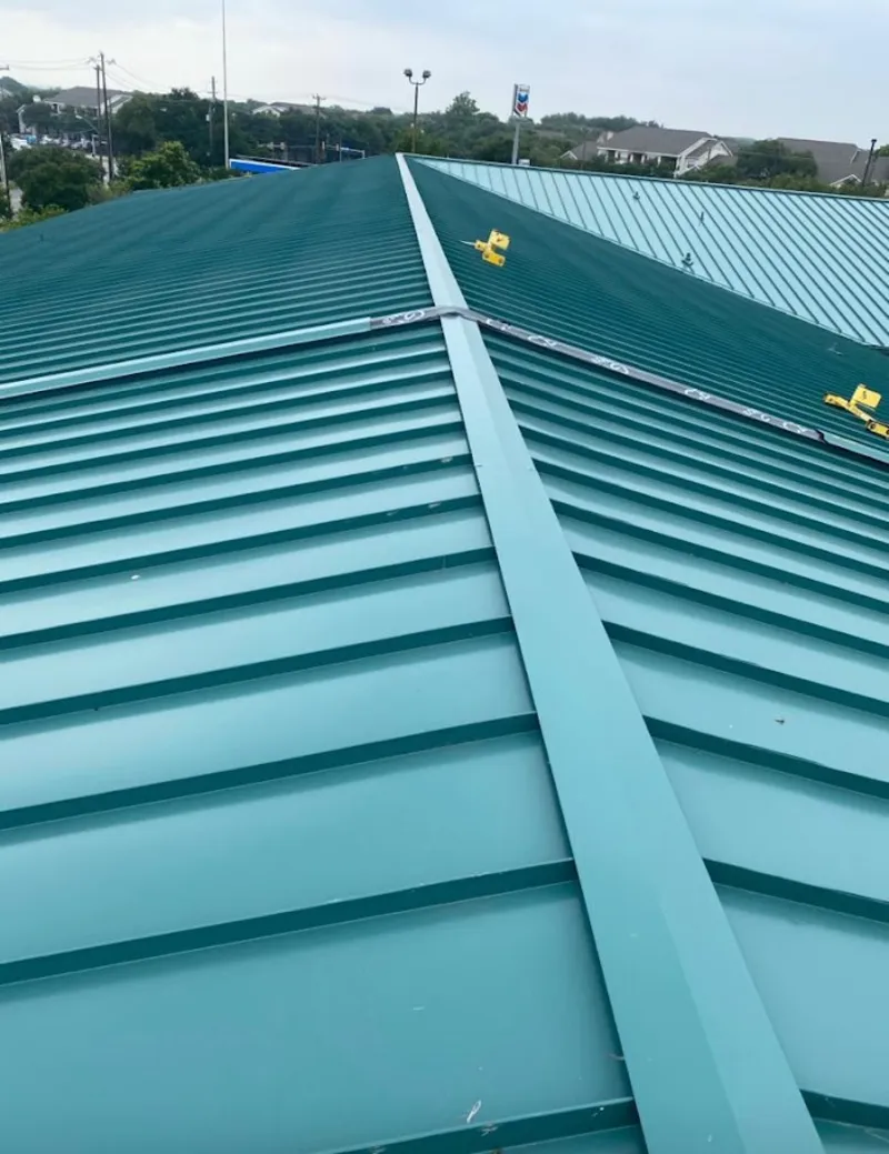 Green commercial metal roof ridge and valley for Metal Roof Repair in Poolesville